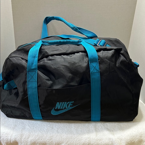 Vintage Nike Black Duffel Bag with Teal Straps - Picture 1 of 9